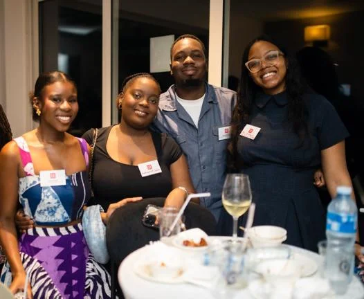A group of alumni pose for a photo during our event in Lagos