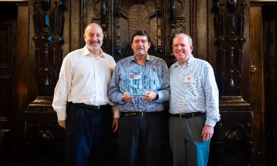 Larry Kramer Tom Kern and John Casey holding Alumni Association plaque June 2025