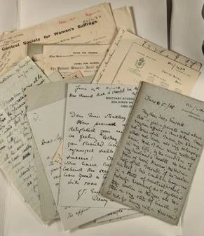 A pile of handwritten letters