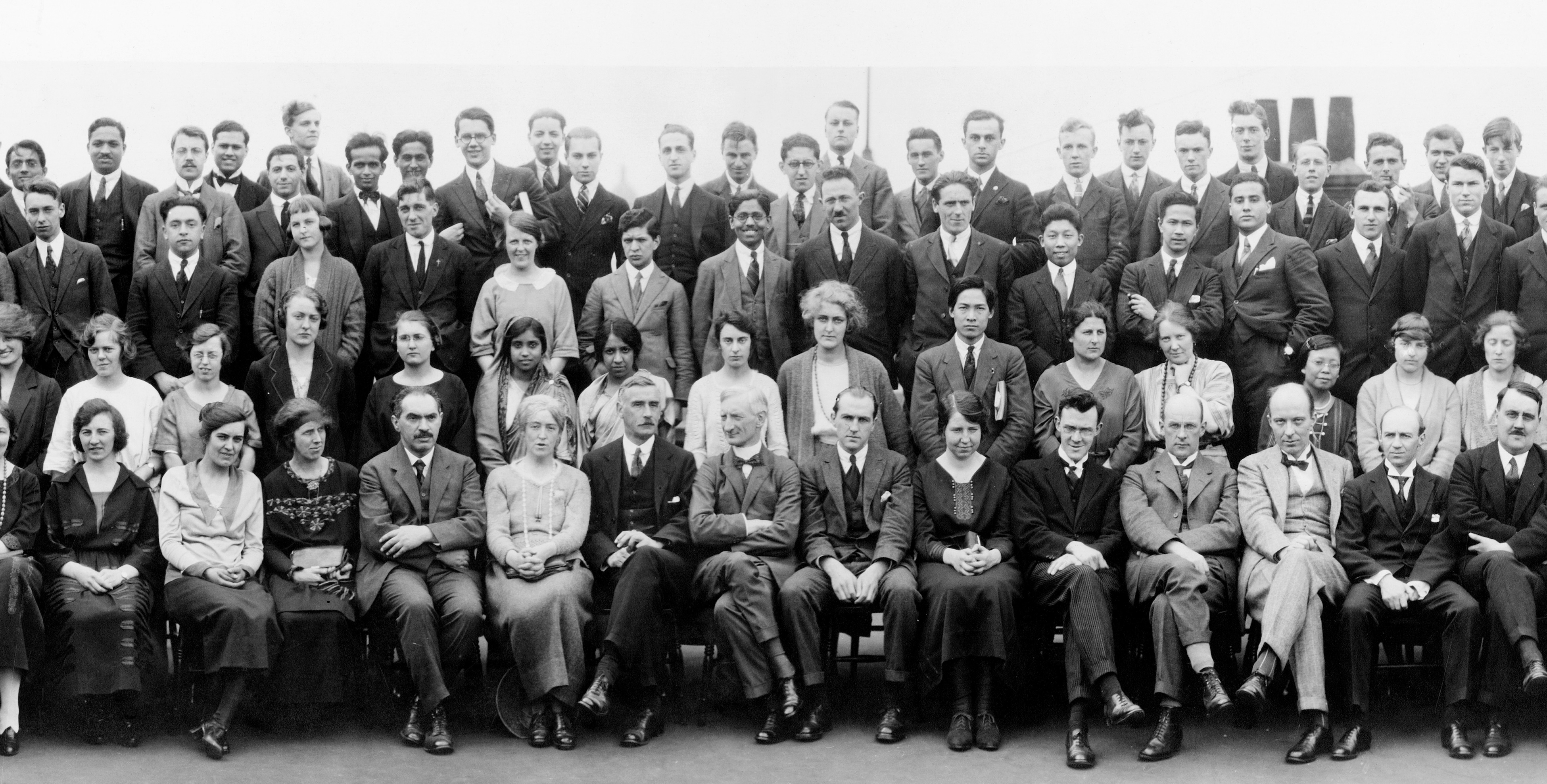 An old photo of members of the school posing as a group.