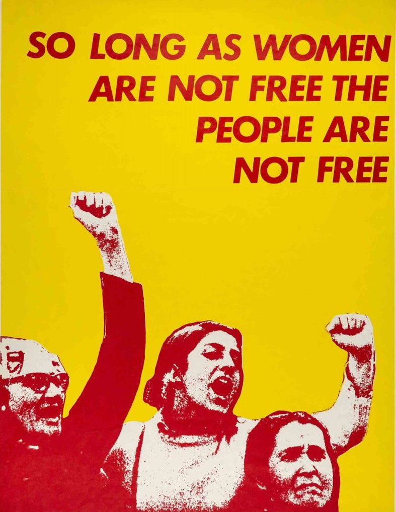 A yellow and red poster including women with raised fists and the words "So long as women are not free the people are not free"