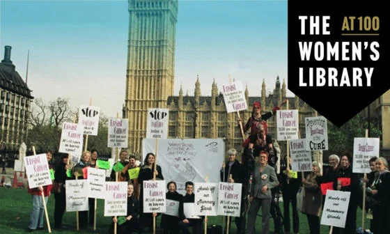 Campaigners with placards gathered on Parliament Green in London