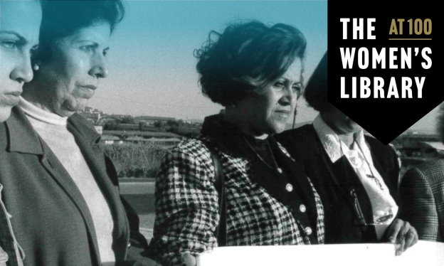 Women stood with solemn faces