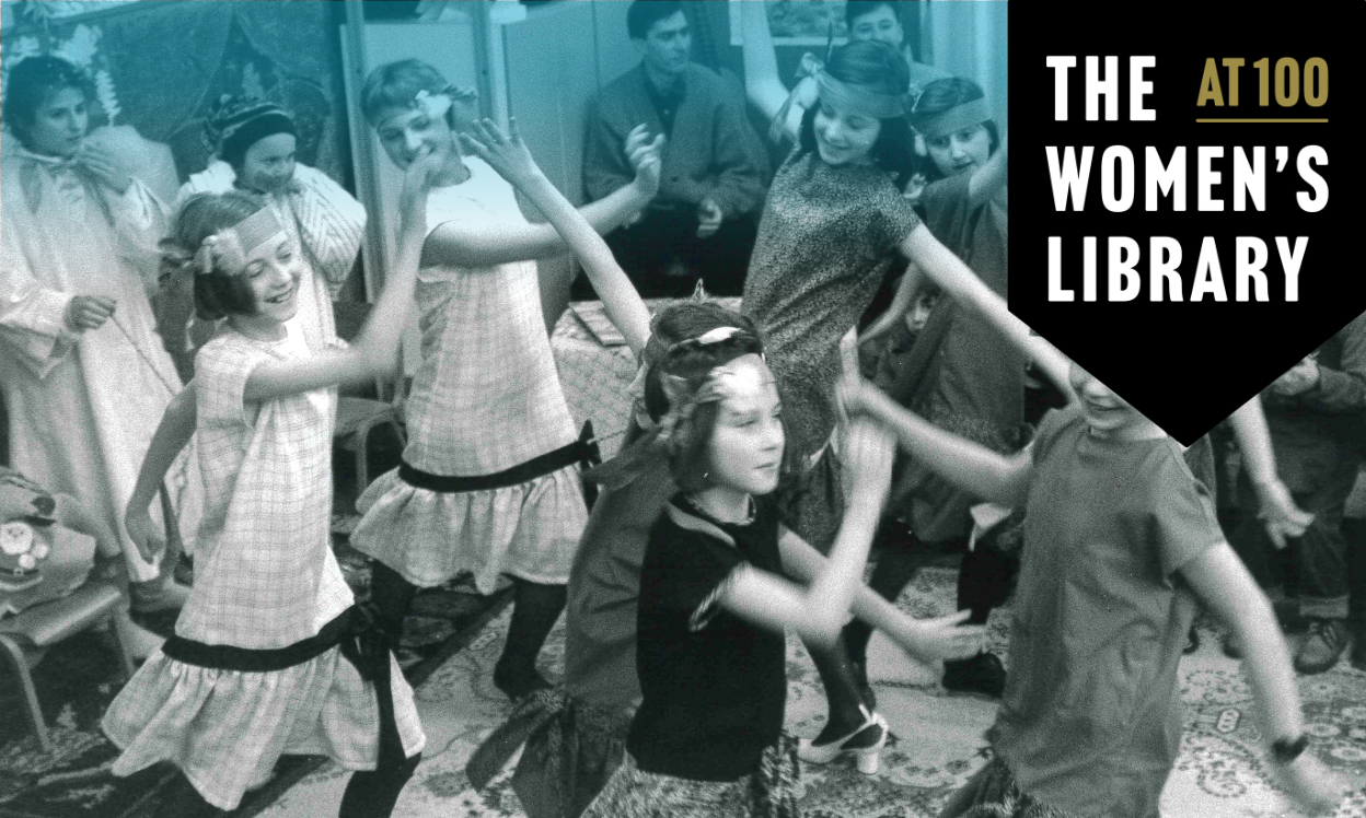 Youngsters dressed in costumes and dancing around a room