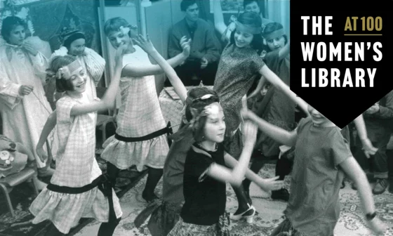 Youngsters dressed in costumes and dancing around a room