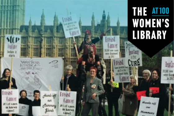 Campaigners with placards gathered on Parliament Green in London
