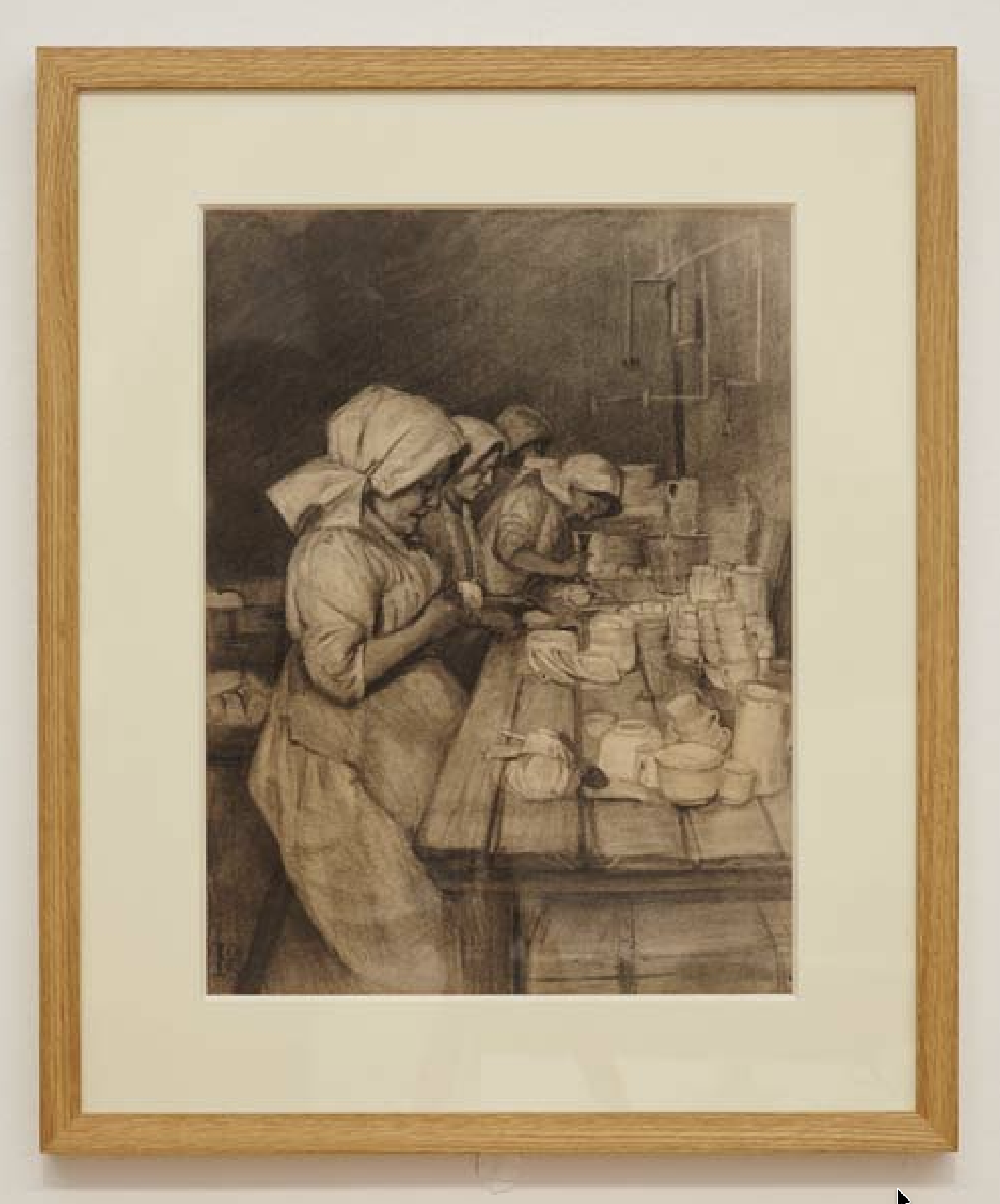 A framed picture called: In the Pot Bank: Sylvia Pankhurst’s drawing of women workers