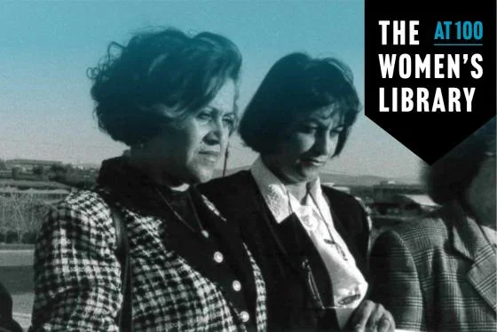 Women stood with solemn faces