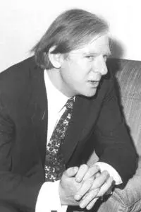 Peter Shore suited and sat talking.