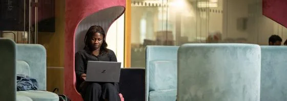 A person studying seated on the 4th floor
