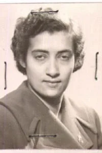 A passport photo of Zuhra Karim.