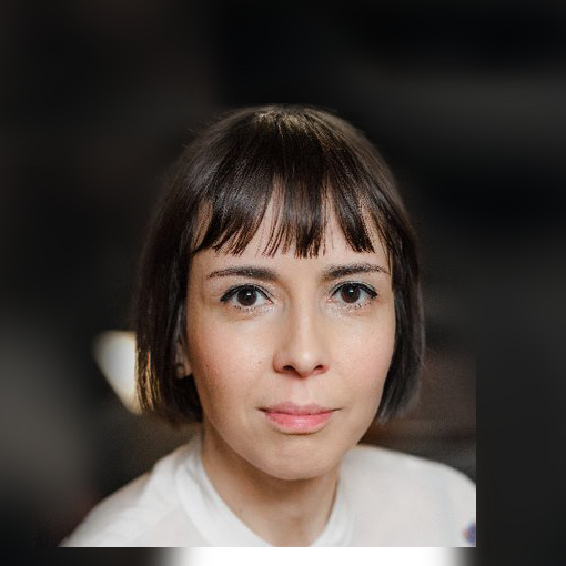 Headshot of woman with short brunette hair