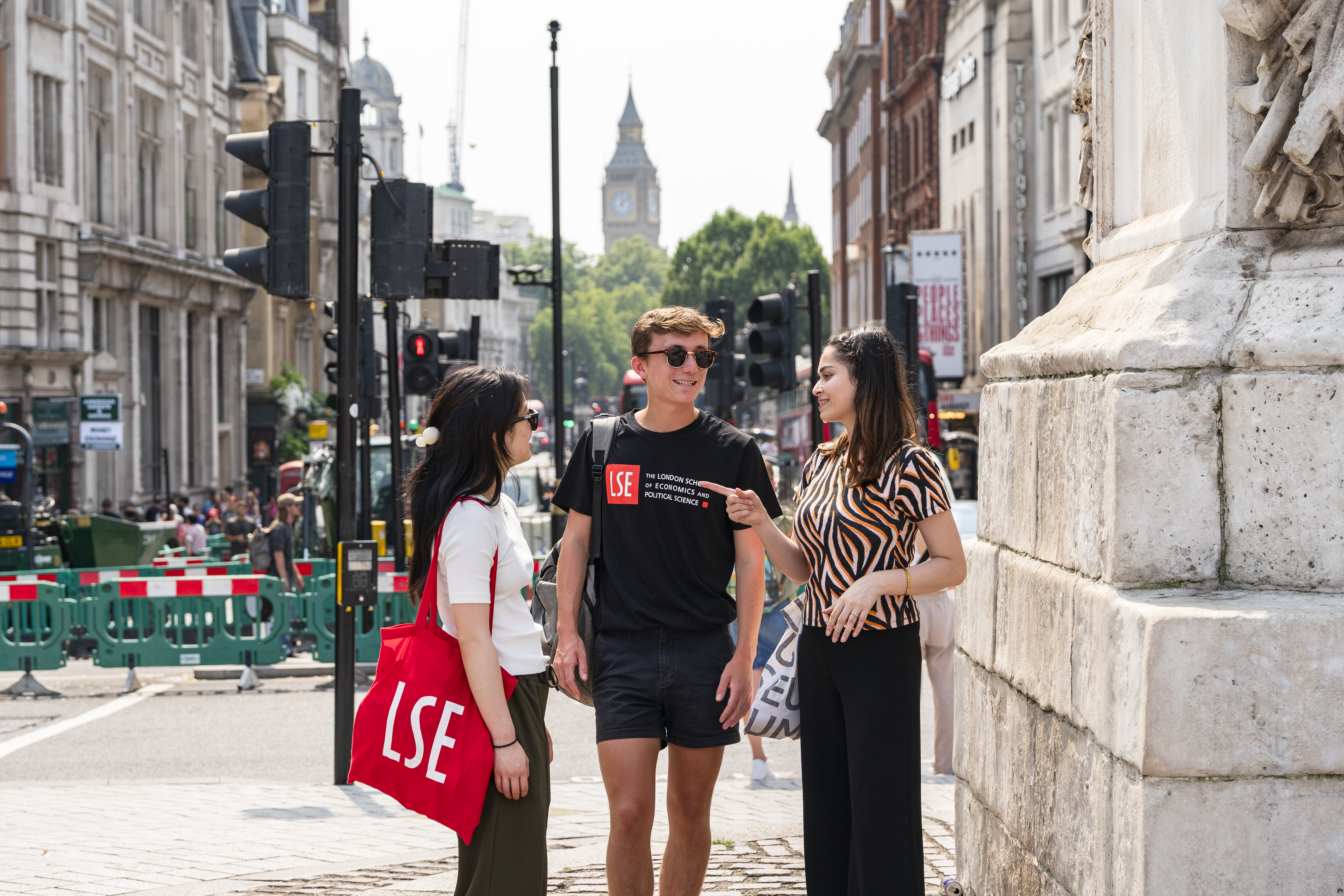 Students talking with Big Ben in the background
