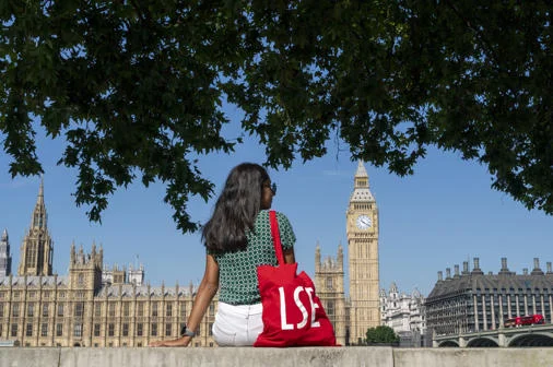 LSE student opposite Houses of Parliament in London