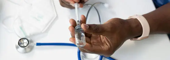 A person holding a stethoscope.