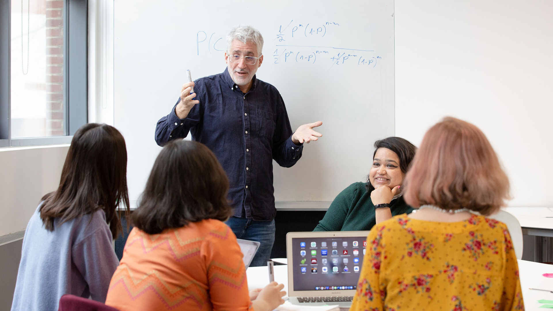 Group discussion in front of whiteboard