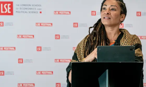 A speaker at a LSE public event