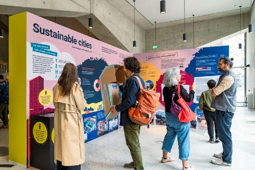 Visitors viewing the LSE Festival 2026 exhibition in the Marshall Building at LSE.