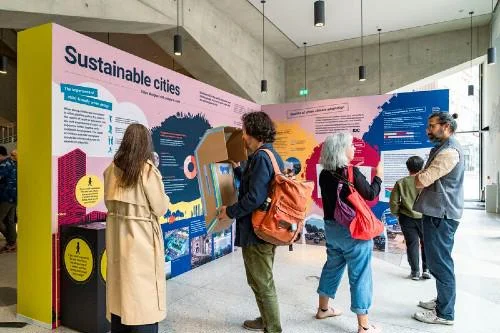 Visitors viewing the LSE Festival 2026 exhibition in the Marshall Building at LSE.