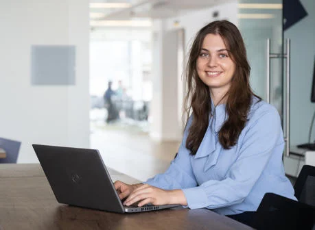 Student studying on a laptop