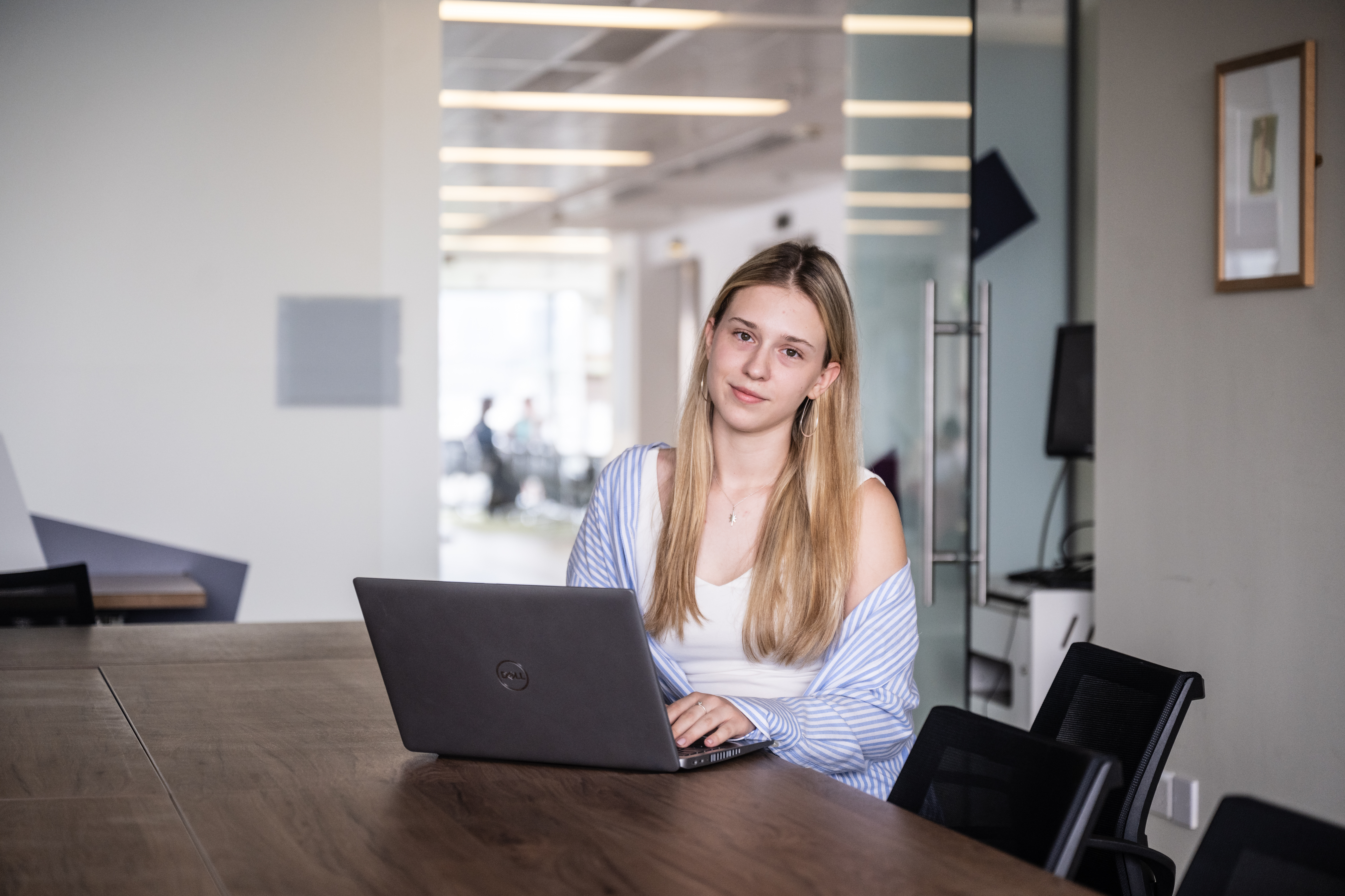 Student using a laptop at a desk