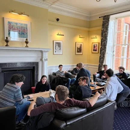 LSE Philosophy students socialising inside the Cumberland Lodge
