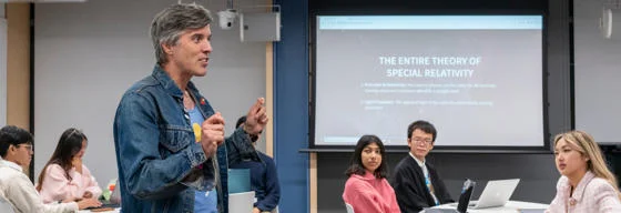 Professor Bryan W. Roberts delivering a lecture