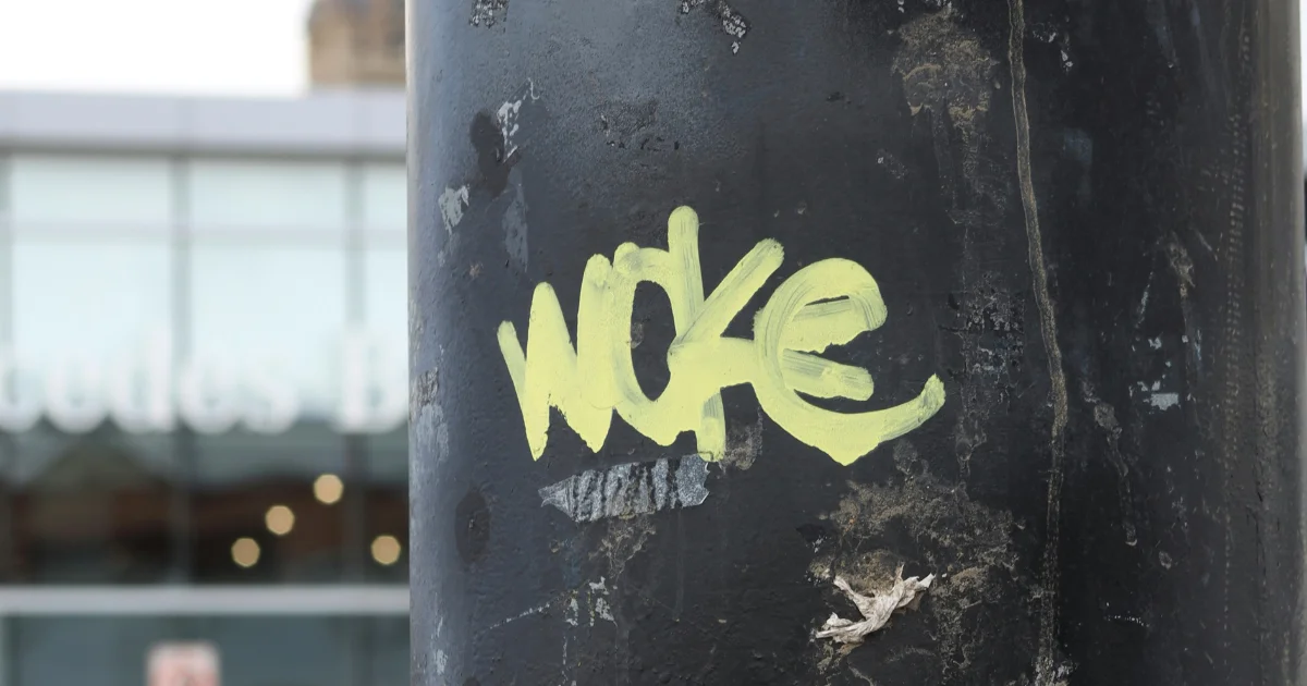 Graffiti of the word "woke"