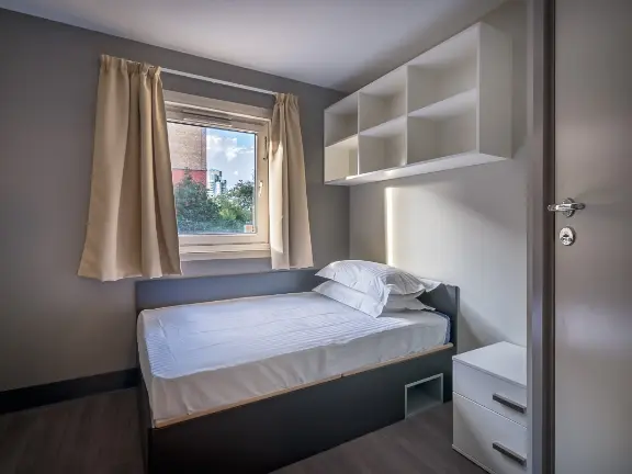 A bedroom in a hall of residence