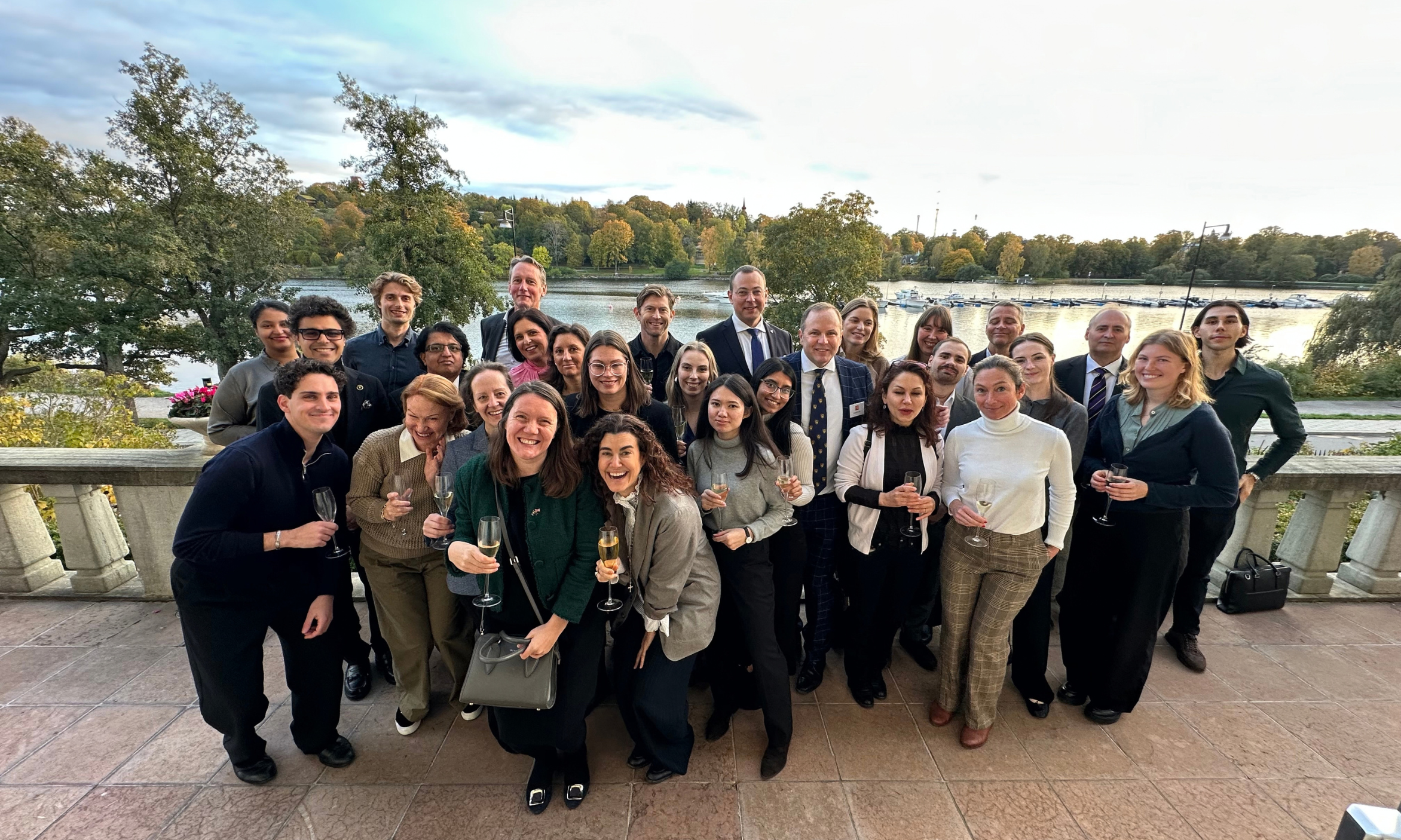 Alumni pose outside during Welcome to the City in Sweden.