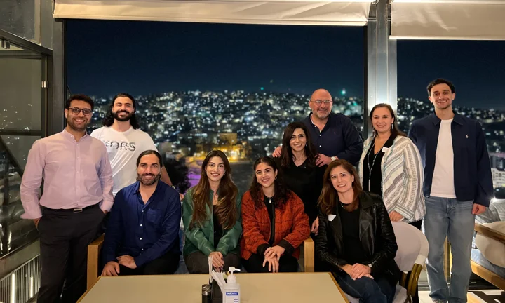 Alumni pose for a photo with Mexico City in the backdrop during Welcome to the City.
