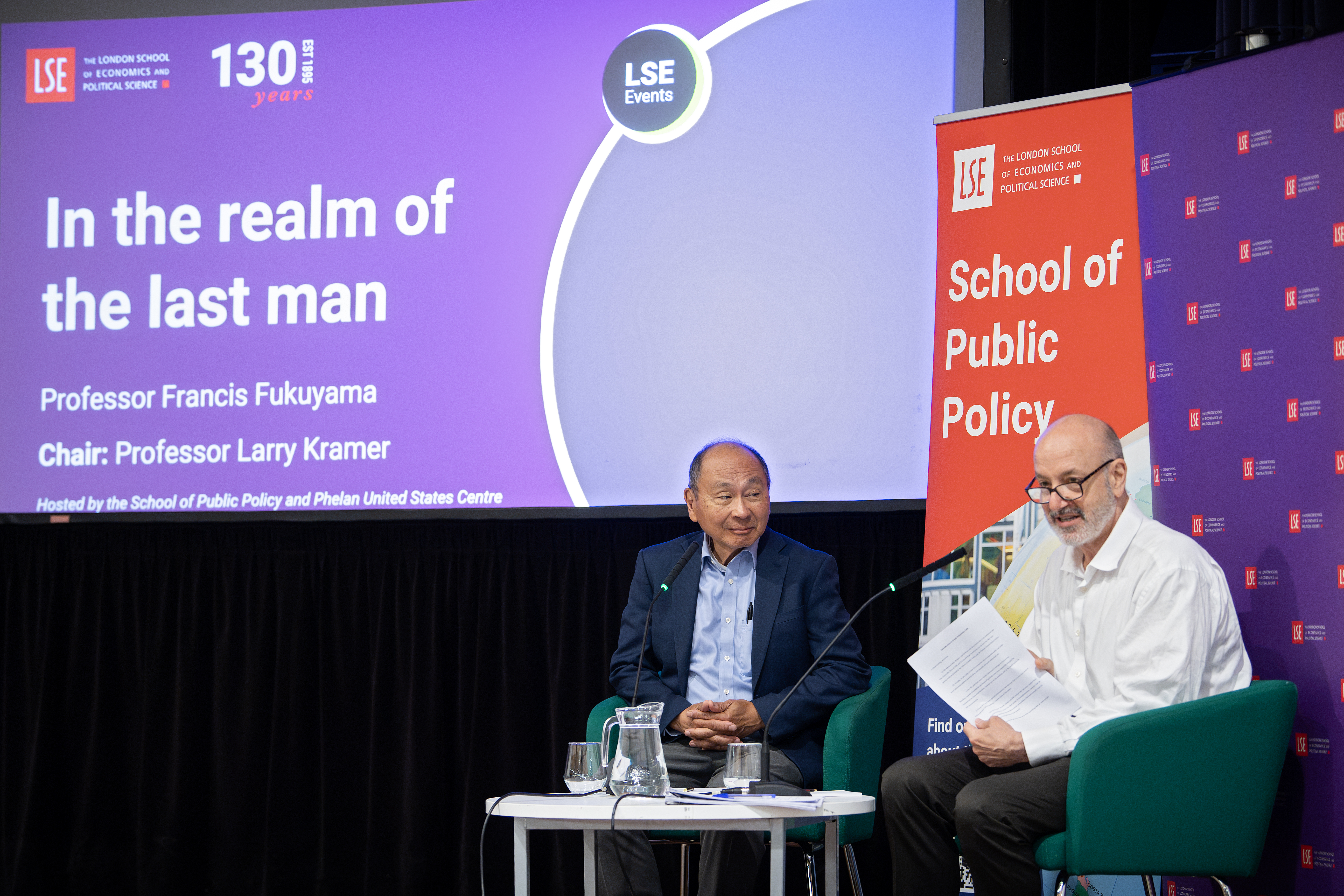 Professor Larry Kramer on stage in discussion with guest Professor Francis Fukuyama 