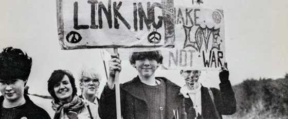 A group of protestors with placards