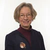 Portrait of Catherine Mann on plain white background