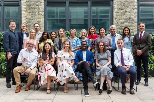 Group photo of Marshall Institute and 100x Impact staff at 2025 summer party.