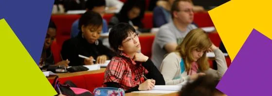 student sitting in lecture hall