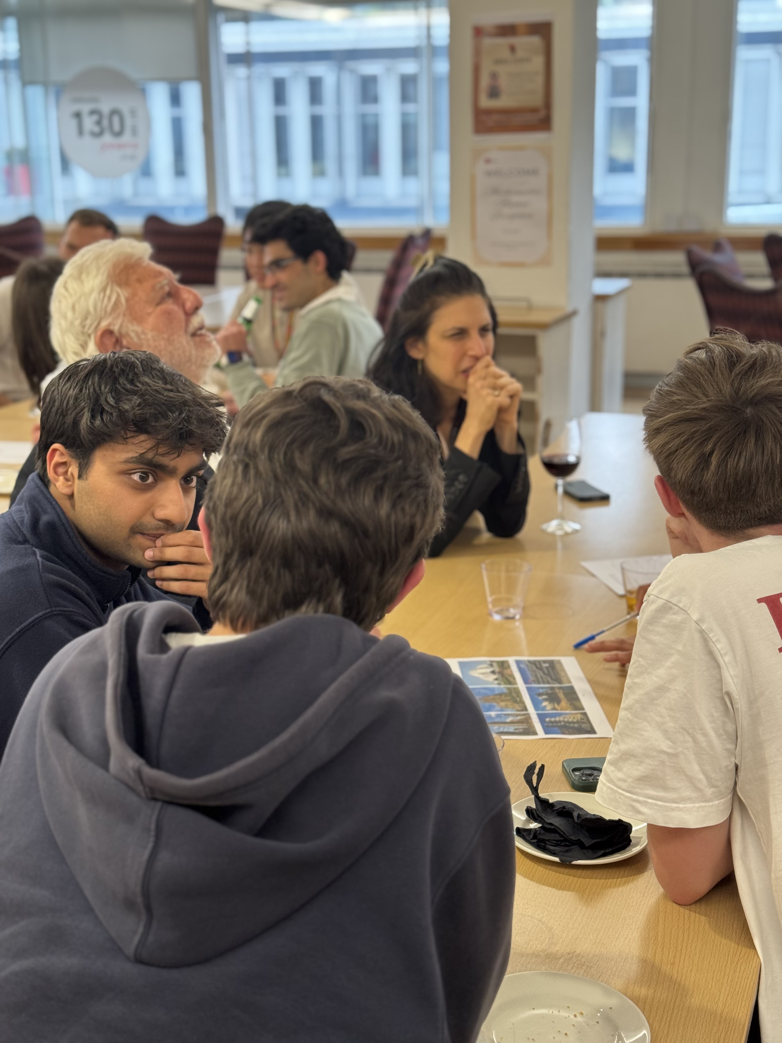 Alumni discussing quiz