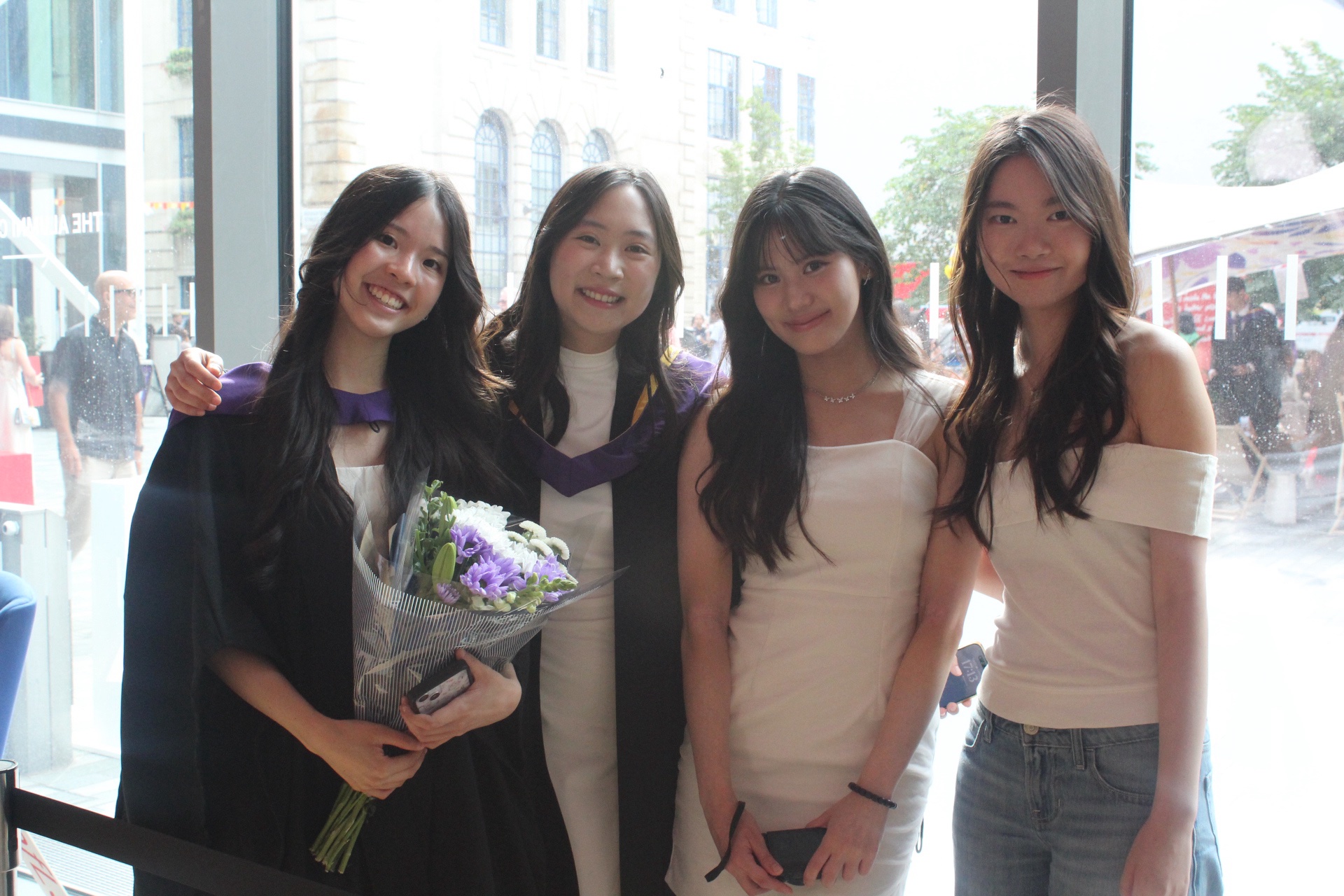 Maths graduates with friends