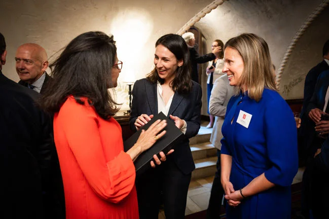 Isabella Luksic receiving Fabian Window from LSE President Minouche Shafik