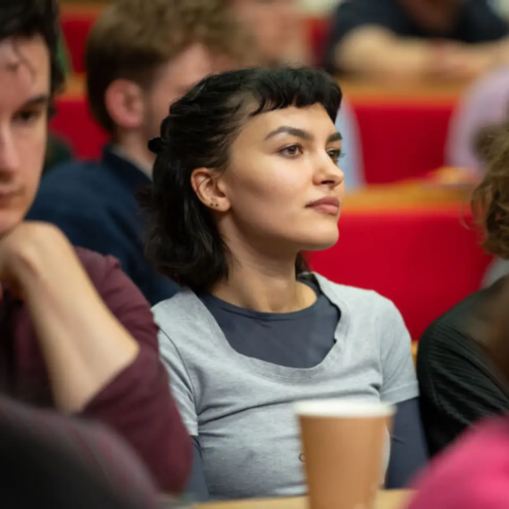 A student in a lecture hall