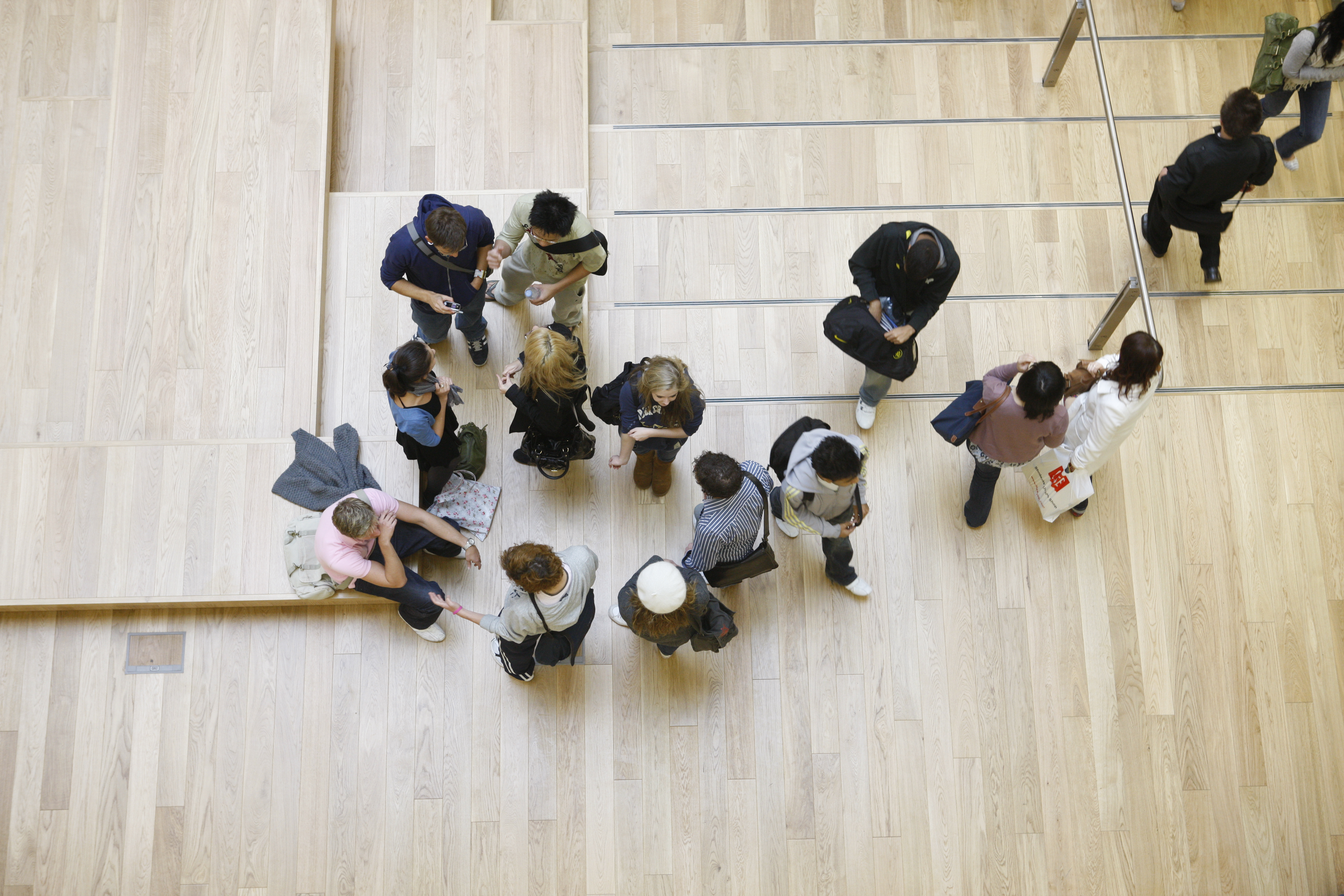Students gather in the meeting area on the ground floor of the Verdant Atrium in the LSE CKK in Lincoln's Inn Fields