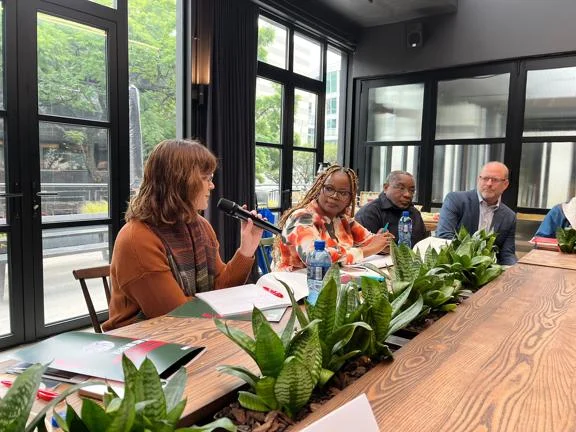 An alumnae speaks during a round-table event in Nairobi