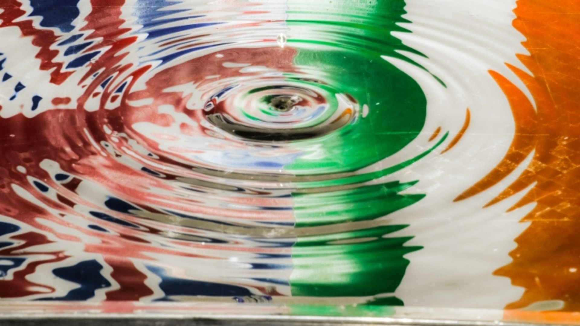 UK and Ireland flags in water ripples