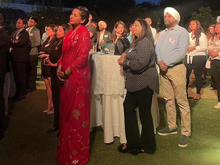 Guests enjoying the Delhi Alumni Reception