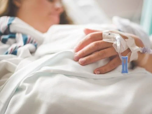 A patient in a hospital bed