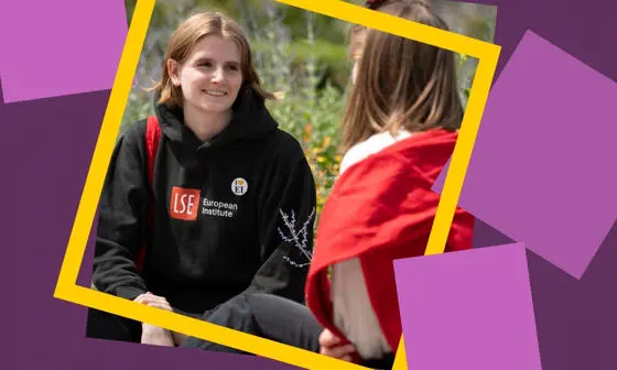 Woman smiling wearing an LSE EI hoodie