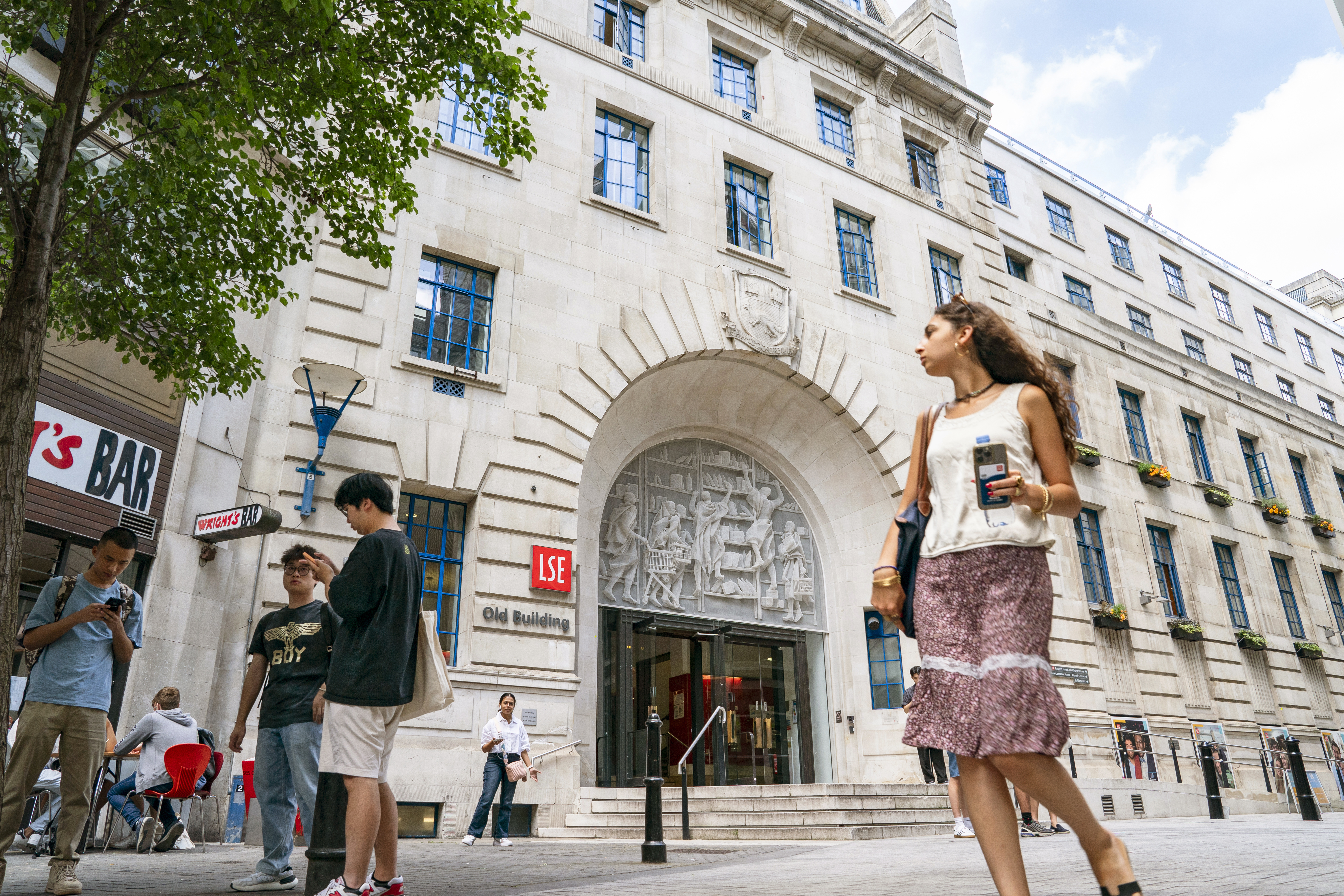 LSE Student walking on campus.