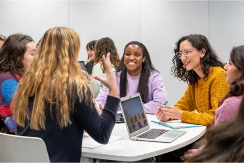 A group of students around a table