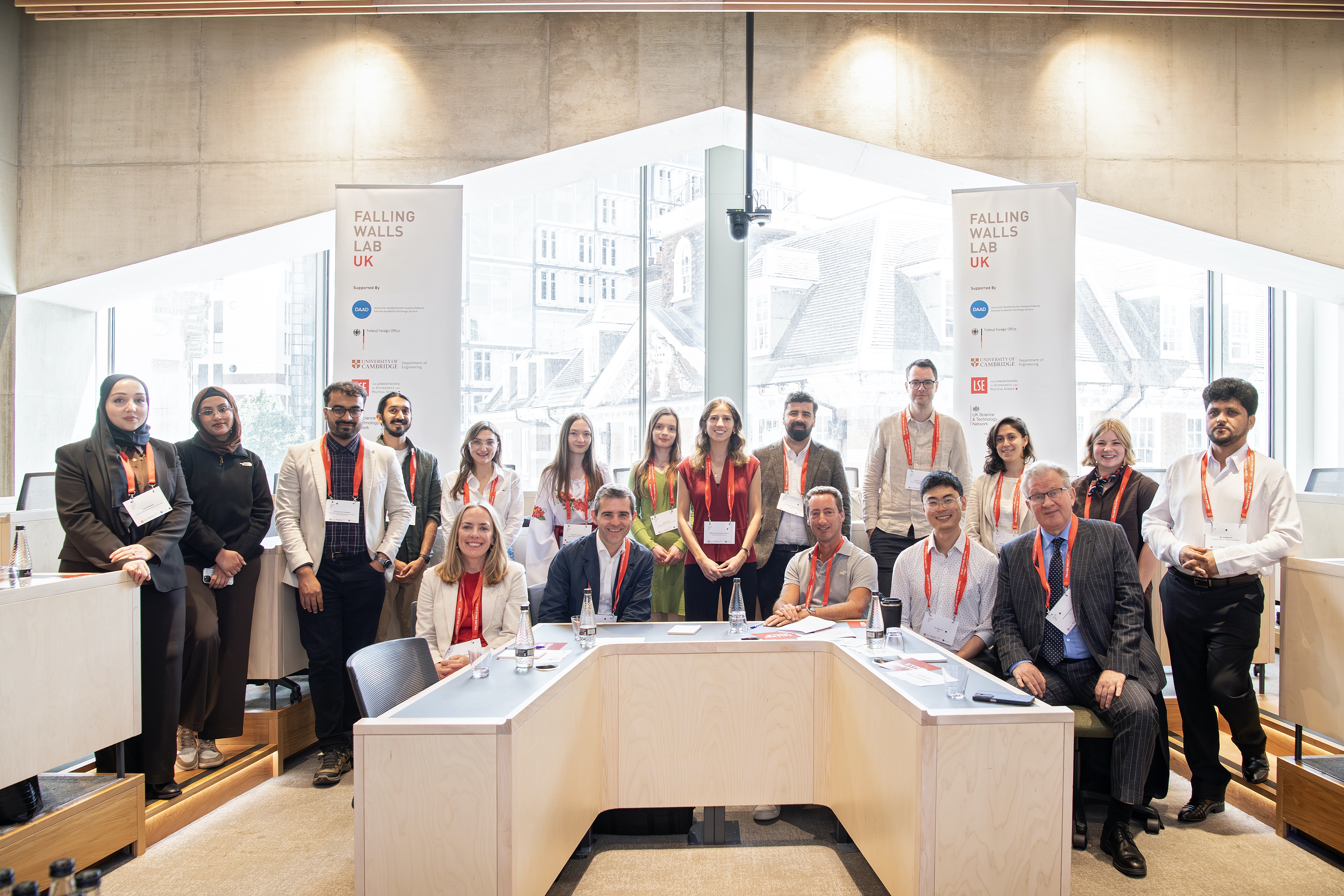 The Falling Walls Lab UK participants posing with the panel of judges at the end of the competition. 