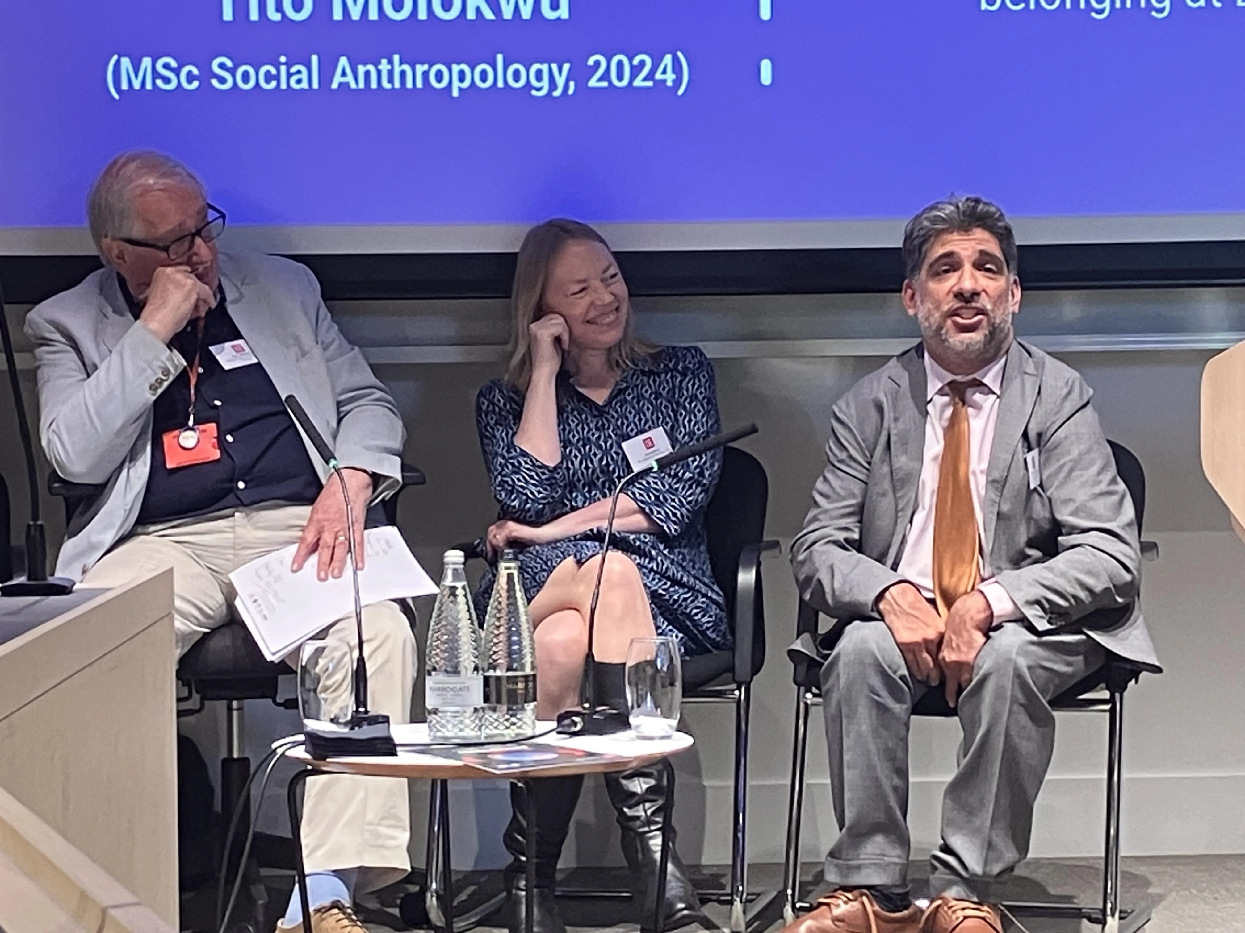 Paulo Dasgupta speaking and Diana Kirsh laughing